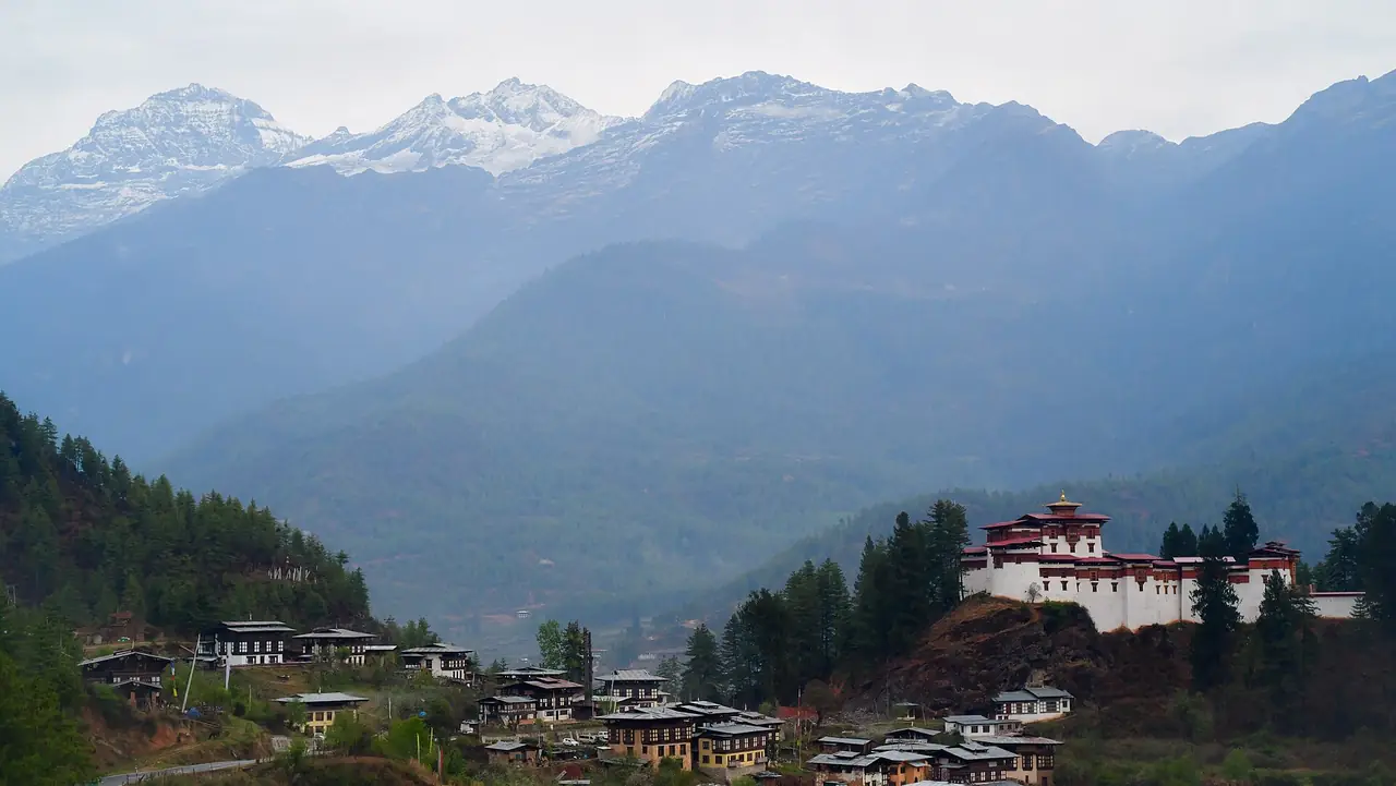 The Paro valley with its dzong and distant snow peaks
